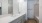 a bathroom with a sink toilet and mirror