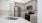 a kitchen with white cabinets